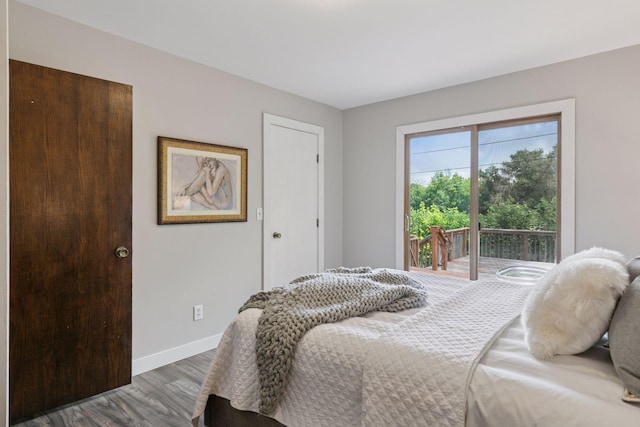 9700 265th St, Elko New Market, MN 55020 - bedroom featuring wood finished floors and access to exterior