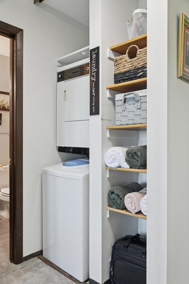 1181 Edgcumbe Rd Unit 501, Saint Paul, MN 55105 - laundry area featuring stacked washer / drying machine