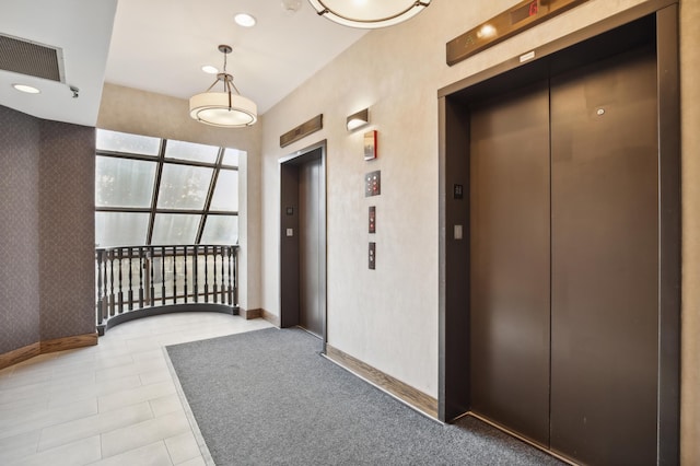 1181 Edgcumbe Rd Unit 501, Saint Paul, MN 55105 - hall featuring elevator, light tile patterned floors, and recessed lighting