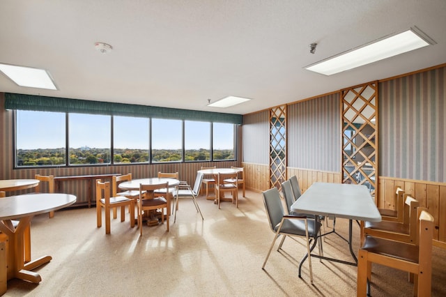 1181 Edgcumbe Rd Unit 501, Saint Paul, MN 55105 - dining space with a wainscoted wall and wallpapered walls
