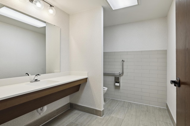 1181 Edgcumbe Rd Unit 501, Saint Paul, MN 55105 - bathroom with tile walls and vanity