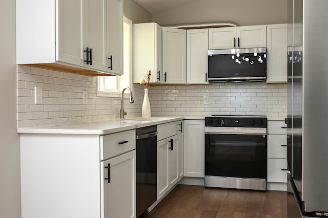 1527 Harvest Ln, Shakopee, MN 55379 - kitchen featuring electric stove, stainless steel microwave, dishwasher, light countertops, and backsplash