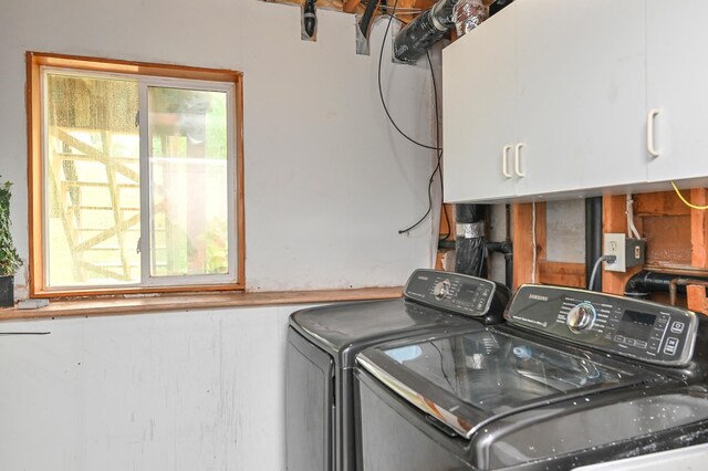 1527 Harvest Ln, Shakopee, MN 55379 - laundry room with cabinet space, washing machine and clothes dryer, and healthy amount of natural light