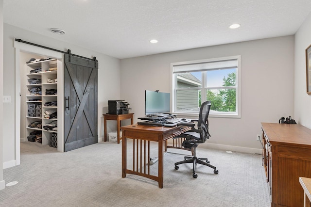 14217 Packard St NE, Ham Lake, MN 55304 - office area featuring a barn door, light colored carpet, and recessed lighting