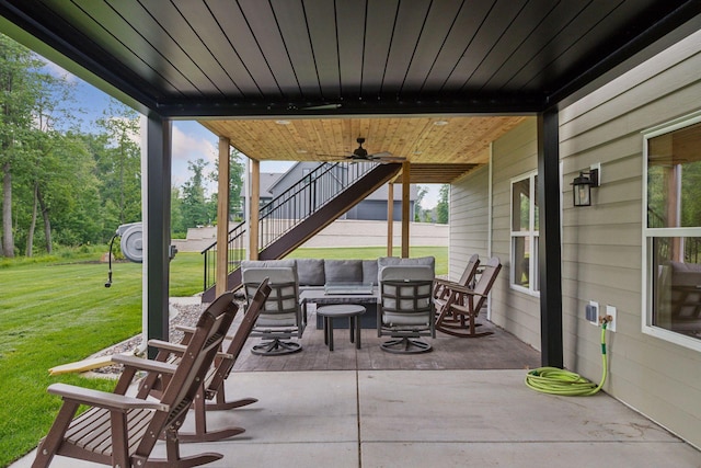14217 Packard St NE, Ham Lake, MN 55304 - view of patio / terrace with stairway, a ceiling fan, and an outdoor hangout area