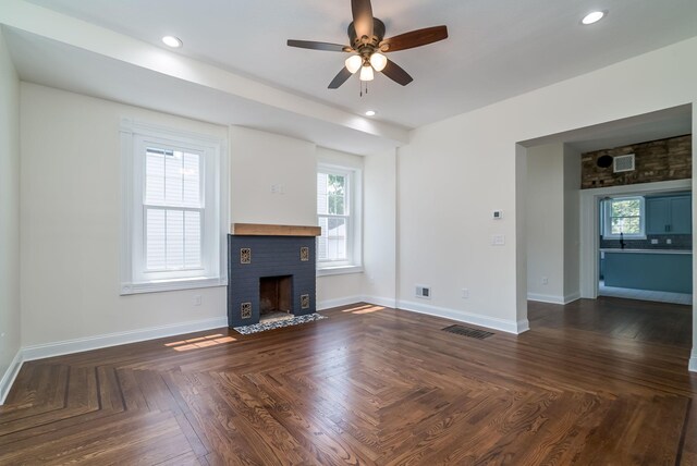 121 Hickory St, Chaska, MN 55318 - unfurnished living room with a ceiling fan, healthy amount of natural light, a fireplace, and recessed lighting