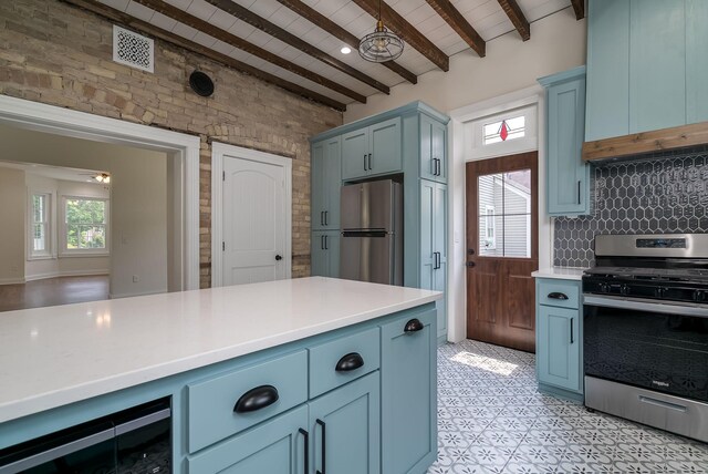 121 Hickory St, Chaska, MN 55318 - kitchen with appliances with stainless steel finishes, wine cooler, light countertops, blue cabinets, and tasteful backsplash