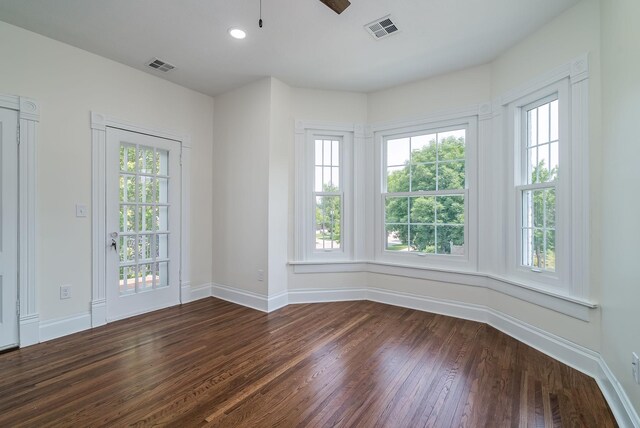 121 Hickory St, Chaska, MN 55318 - empty room featuring wood finished floors, healthy amount of natural light, a ceiling fan, and recessed lighting