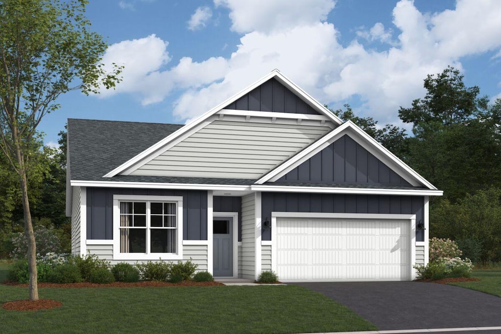 1252 150th St W, Rosemount, MN 55068 - view of front facade featuring board and batten siding, a garage, roof with shingles, and a front yard