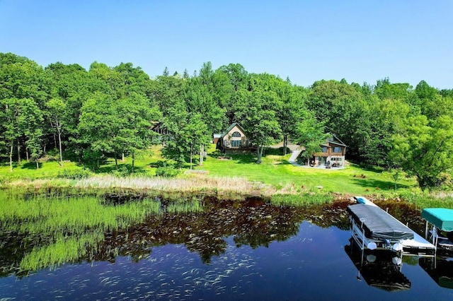 W6741 Lakewood Blvd, Dewey Twp, WI 54848 - dock area featuring a forest view and a water view