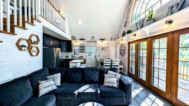W6741 Lakewood Blvd, Dewey Twp, WI 54848 - living room featuring high vaulted ceiling and french doors