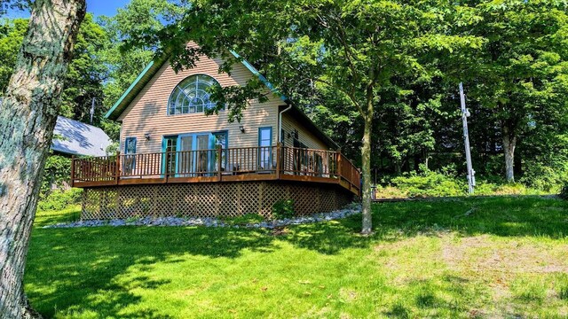 W6741 Lakewood Blvd, Dewey Twp, WI 54848 - back of property with a deck and a yard
