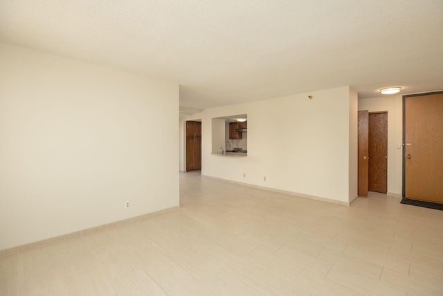 220 Broadway Ave S Unit 1221, Rochester, MN 55904 - spare room with a textured ceiling