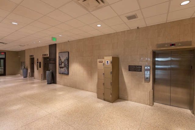 220 Broadway Ave S Unit 1221, Rochester, MN 55904 - community lobby with recessed lighting, a drop ceiling, and tile walls