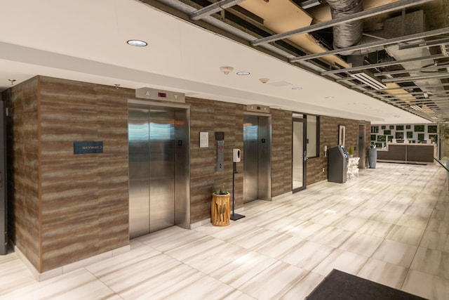 220 Broadway Ave S Unit 1221, Rochester, MN 55904 - lobby featuring wood walls