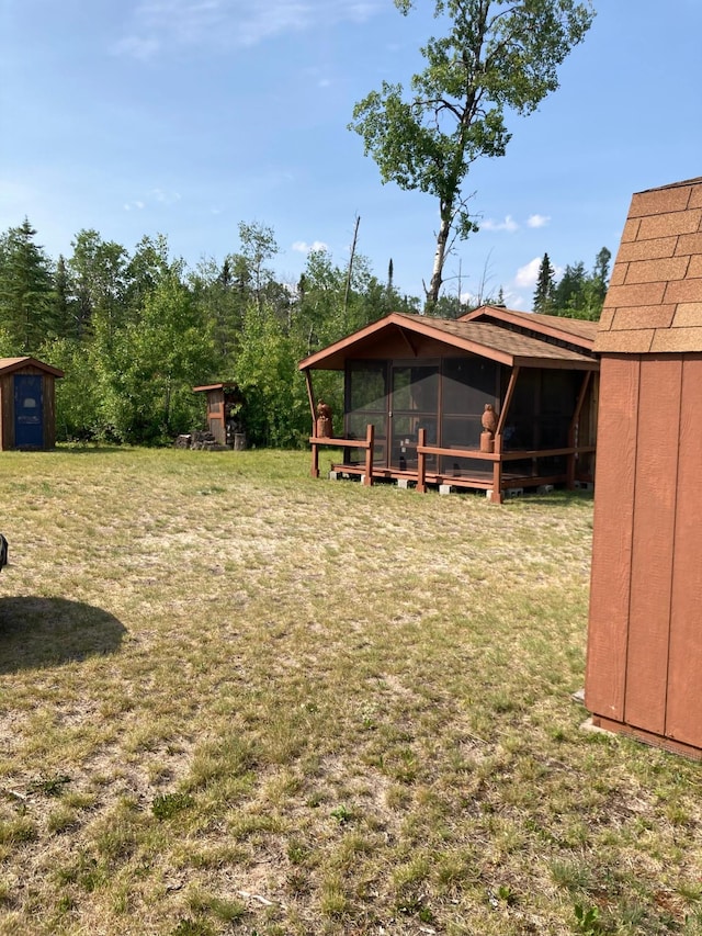 TBD Thompson Forest Rd, Roseau, MN 56751 - view of green lawn featuring a storage unit