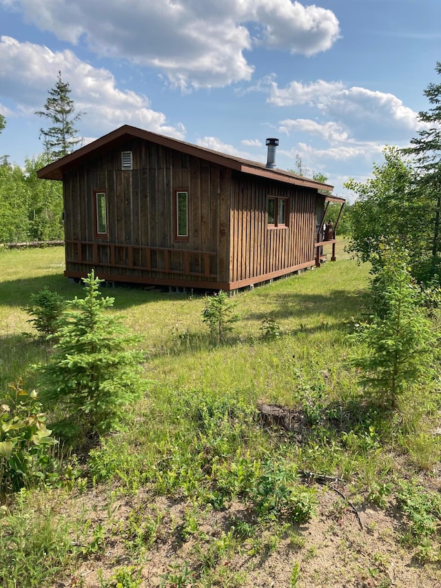 TBD Thompson Forest Rd, Roseau, MN 56751 - rear view of house with a lawn