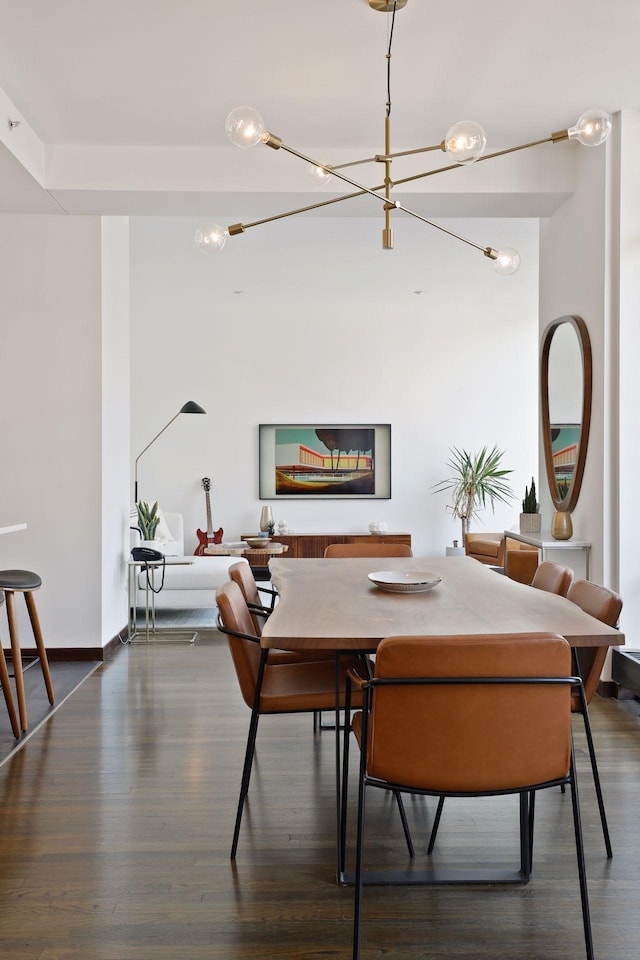 201 11th St Unit 530, Minneapolis, MN 55403 - dining space with a chandelier and wood finished floors