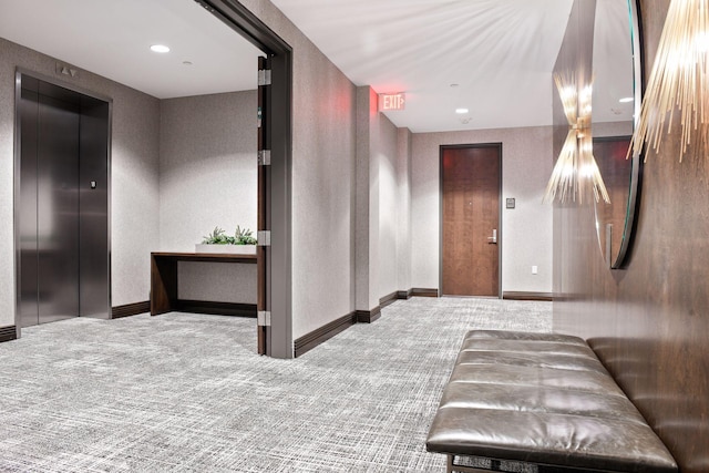201 11th St Unit 530, Minneapolis, MN 55403 - hallway featuring elevator, carpet flooring, and a textured wall