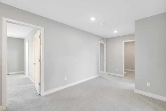 14320 Alder Way, Rosemount, MN 55068 - unfurnished room with light colored carpet, recessed lighting, and a smoke detector