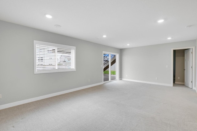 14320 Alder Way, Rosemount, MN 55068 - spare room with recessed lighting, light colored carpet, and a smoke detector