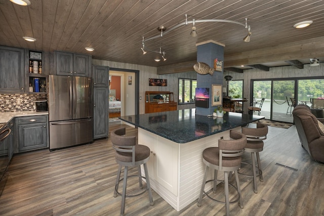 40536 Ryans Bay Rd, Zumbro Twp, MN 55991 - kitchen with freestanding refrigerator, wooden ceiling, wood finished floors, open floor plan, and plenty of natural light