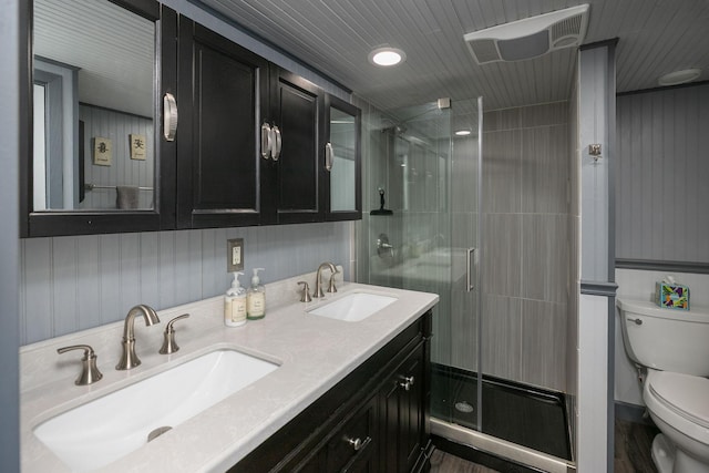 40536 Ryans Bay Rd, Zumbro Twp, MN 55991 - full bathroom featuring a stall shower and double vanity