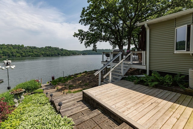 40536 Ryans Bay Rd, Zumbro Twp, MN 55991 - wooden terrace featuring a water view