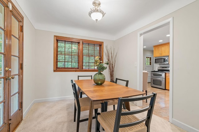2709 Ewing Ave N, Robbinsdale, MN 55422 - dining space with recessed lighting and light carpet