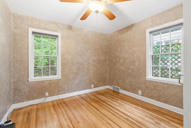 2709 Ewing Ave N, Robbinsdale, MN 55422 - spare room featuring wood finished floors and a ceiling fan