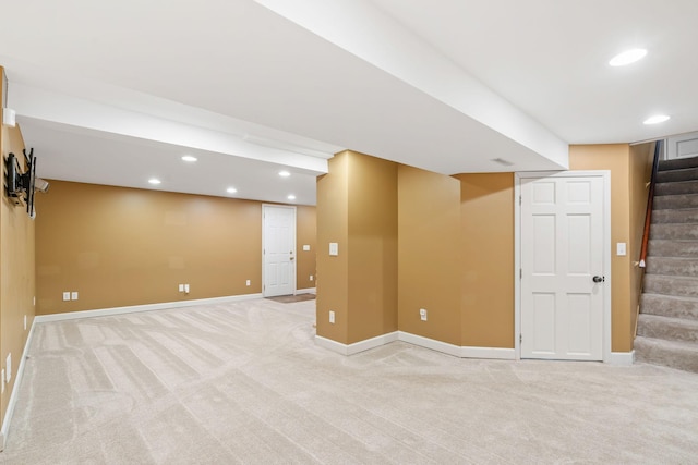 2709 Ewing Ave N, Robbinsdale, MN 55422 - finished below grade area with light carpet, stairs, and recessed lighting
