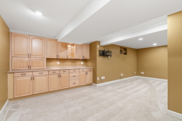 2709 Ewing Ave N, Robbinsdale, MN 55422 - kitchen with light brown cabinets, light carpet, glass insert cabinets, light countertops, and recessed lighting