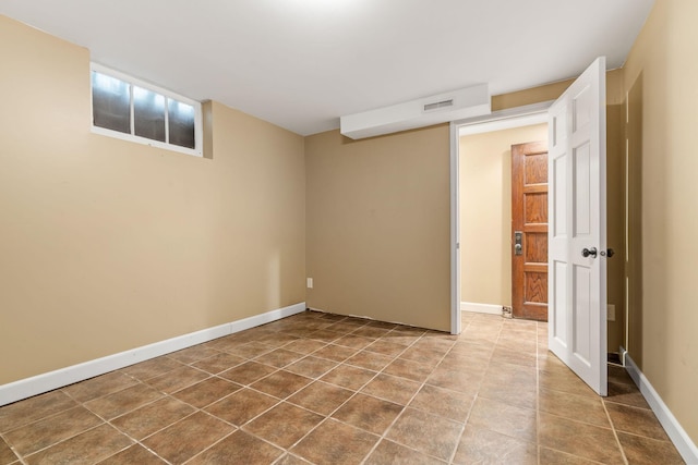 2709 Ewing Ave N, Robbinsdale, MN 55422 - unfurnished bedroom featuring baseboards and tile patterned floors