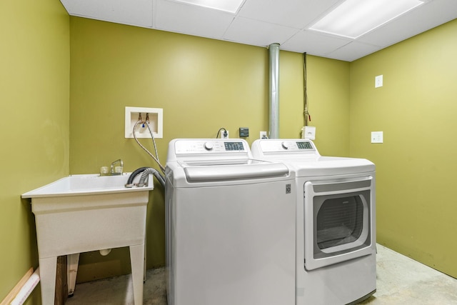 2709 Ewing Ave N, Robbinsdale, MN 55422 - laundry area featuring washing machine and dryer