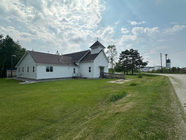 200 Park Ave, Williams, MN 56686 - rear view of property featuring a yard