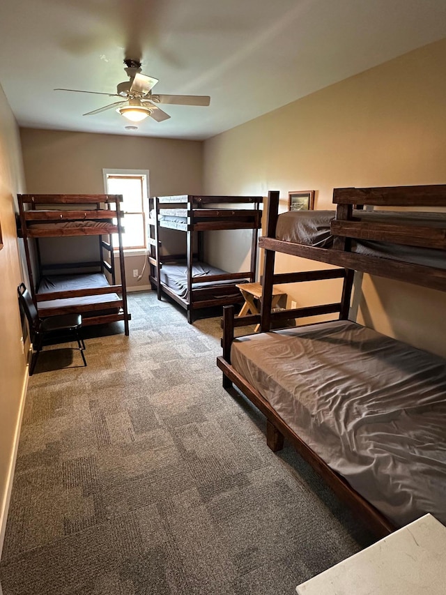 200 Park Ave, Williams, MN 56686 - carpeted bedroom with baseboards and a ceiling fan