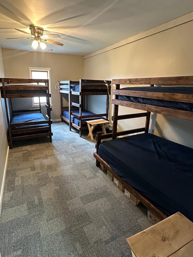 200 Park Ave, Williams, MN 56686 - carpeted bedroom featuring baseboards and ceiling fan