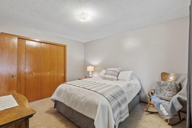 13048 Jay St NW, Coon Rapids, MN 55448 - bedroom with light carpet, a closet, and a textured ceiling