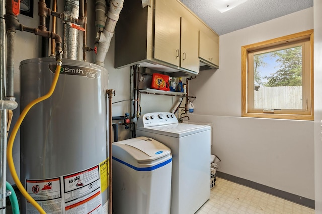 13048 Jay St NW, Coon Rapids, MN 55448 - washroom with water heater, light flooring, washing machine and clothes dryer, and cabinet space