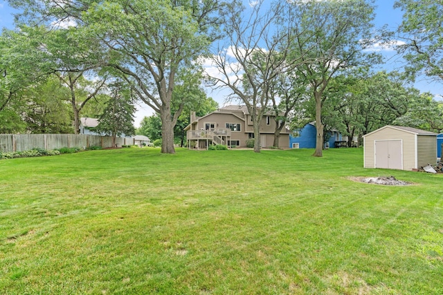 13048 Jay St NW, Coon Rapids, MN 55448 - view of yard featuring a storage unit