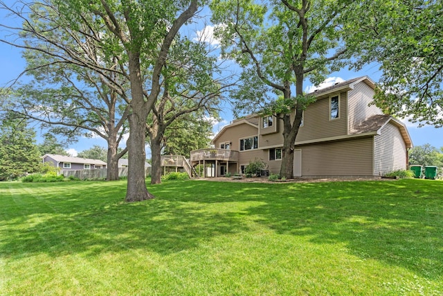 13048 Jay St NW, Coon Rapids, MN 55448 - view of green lawn featuring a deck and stairway