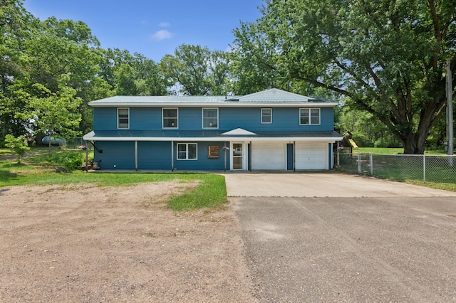 2796 269th Ave NE, Isanti, MN 55040 - view of front facade with asphalt driveway and a garage
