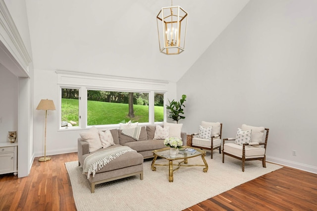 5713 Duncan Ln, Edina, MN 55436 - living room with wood finished floors, a chandelier, and high vaulted ceiling