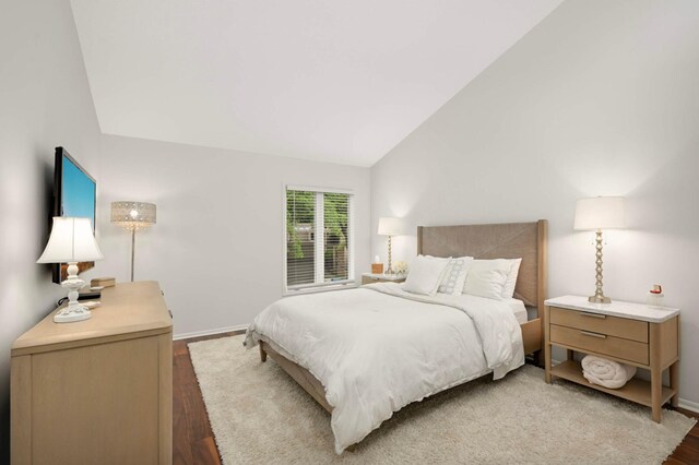 5713 Duncan Ln, Edina, MN 55436 - bedroom with lofted ceiling and wood finished floors