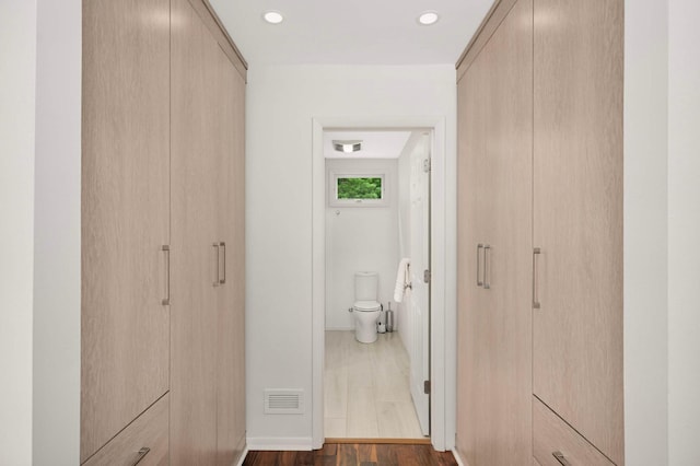 5713 Duncan Ln, Edina, MN 55436 - corridor with dark wood-style flooring and recessed lighting