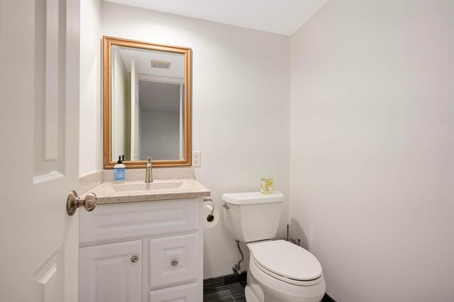 5713 Duncan Ln, Edina, MN 55436 - bathroom with vanity and toilet