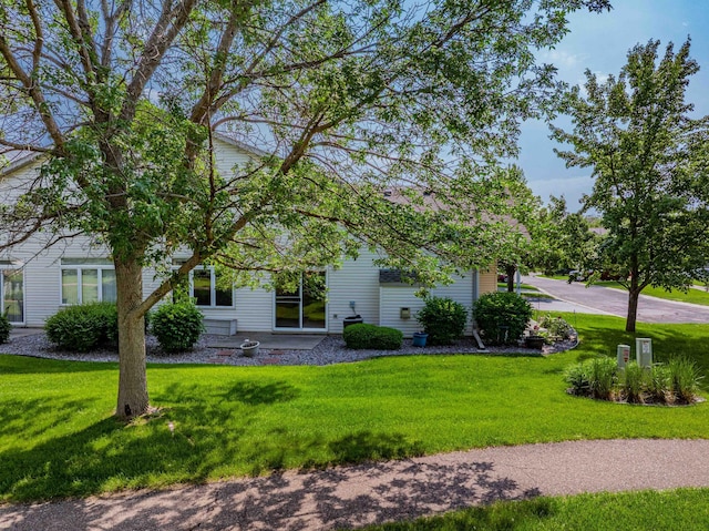 1152 Crystal Pl W, Chaska, MN 55318 - obstructed view of property featuring a front yard