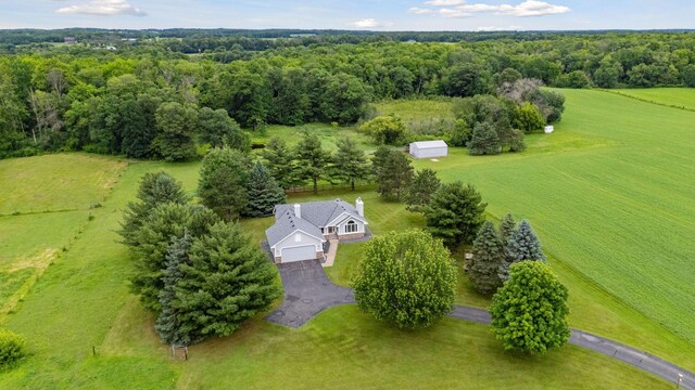 2771 County Line Ave, Osceola, WI 54020 - aerial view of property and surrounding area featuring a heavily wooded area