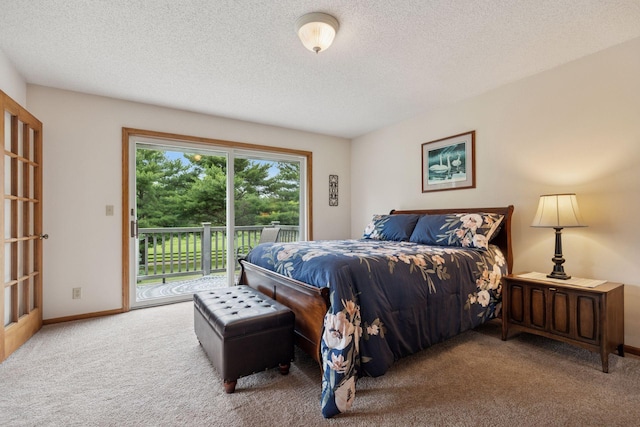 2771 County Line Ave, Osceola, WI 54020 - carpeted bedroom with access to exterior and a textured ceiling