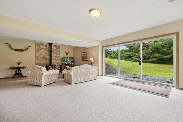 2771 County Line Ave, Osceola, WI 54020 - living area with carpet flooring and a wood stove